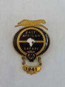 An AA East Africa Safari enamel lapel badge by W.C. Lewis with a 1941 date bar attached.