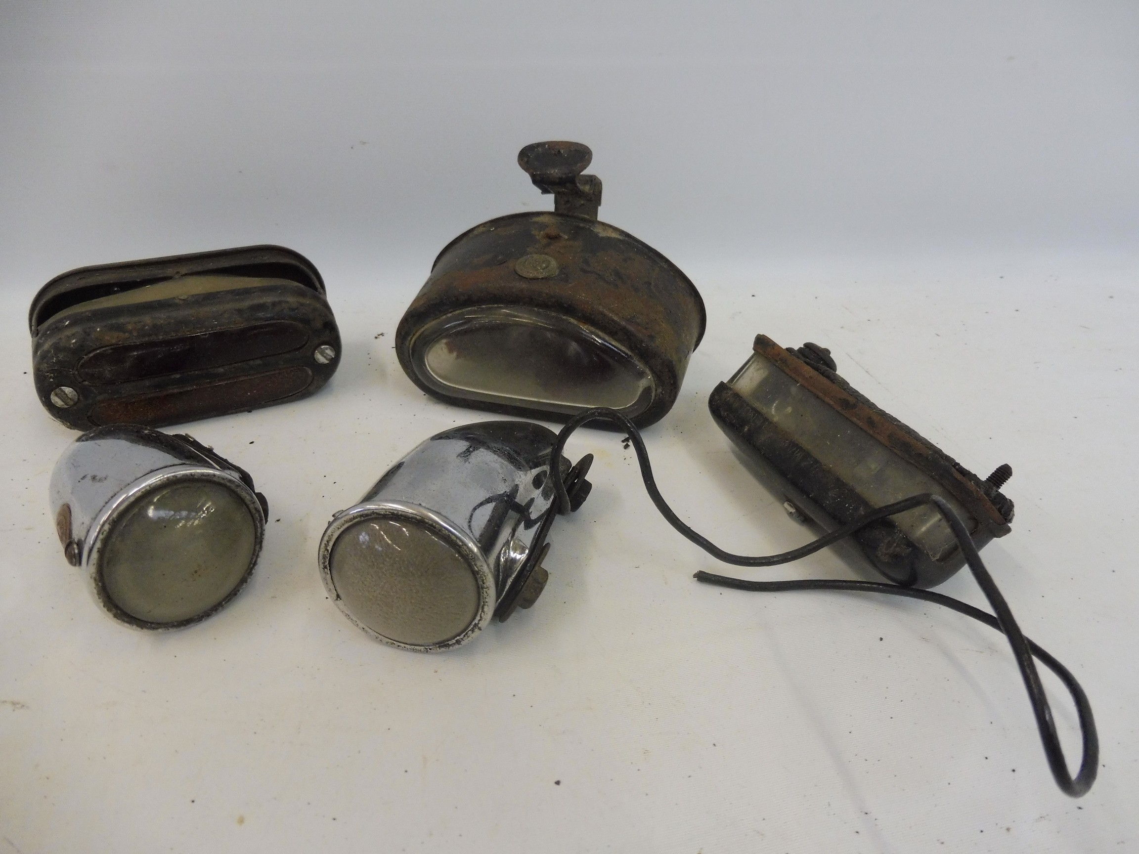 A pair of Lucas wing mounted side lamps, Butler and Lucas lamps etc.