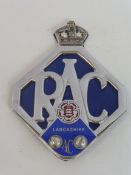 An RAC lozenge shaped badge with Lancashire AC attachment.