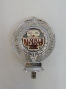 A Royal Automobile Club Associate car badge with Trailer Caravan Club enamel centre, no. F40402.