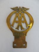 An AA car badge, brass, no. 296020, October 1920 - September 1921.