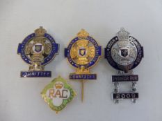 Three Royal Irish Automobile Club badges, two for the committee, one other with 'Pioneer Run' bar,