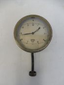 A Smiths silver faced eight day car clock, working.