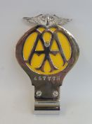 An early yellow back AA badge with centre screw, badge bar mounting, stamped 45777H, May 1934-