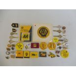 A selection of AA badges, enamel and plastic, AA keys, an early plastic window badge etc.