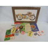 A selection of motorcycle badges, posters, brochures etc.