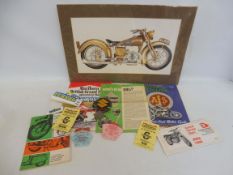 A selection of motorcycle badges, posters, brochures etc.