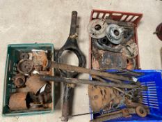 Three boxes of assorted parts including Morris, a repaired cylinder head and a rear axle casing