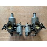 A pair of SU carburettors, formerly fitted to an MGB.