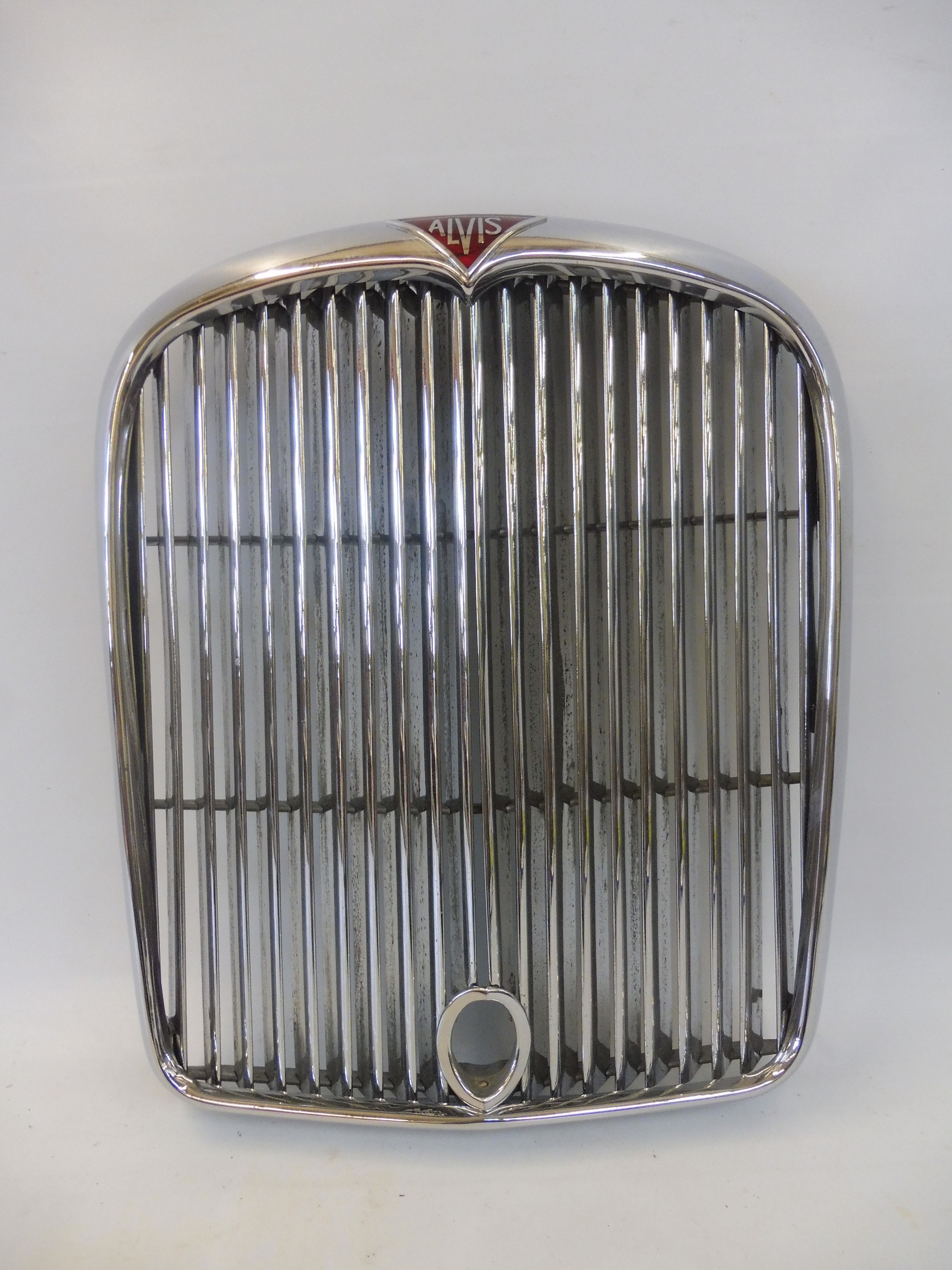 An Alvis TD radiator grille, new old stock and never fitted to a car.