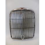 An Alvis TD radiator grille, new old stock and never fitted to a car.