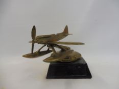 A Schneider Trophy type car mascot in the form of a seaplane on a radiator cap, polished brass, no
