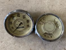 A pair of cream faced instruments 0-70 mph speedometer and a combined amp, fuel and oil gauge,