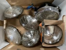 A box of mostly n.o.s. Lucas sealed beam units, B.M.C.