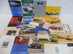 A quantity of French car brochures including Citroen, Peugeot and Renault.