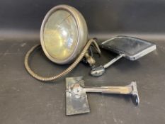A windscreen mounted pass lamp, plus a Desmo style rectangular rear view mirror and one other.