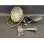 A windscreen mounted pass lamp, plus a Desmo style rectangular rear view mirror and one other.