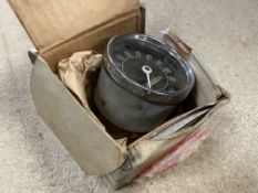 A boxed Smiths 0-110 mph black faced speedometer.