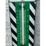 A Duckham's Adcoids black and white enamel thermometer, 11 x 45".