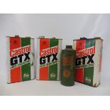 Three Castrol GTX gallon cans plus a Castrol cardboard quart can.