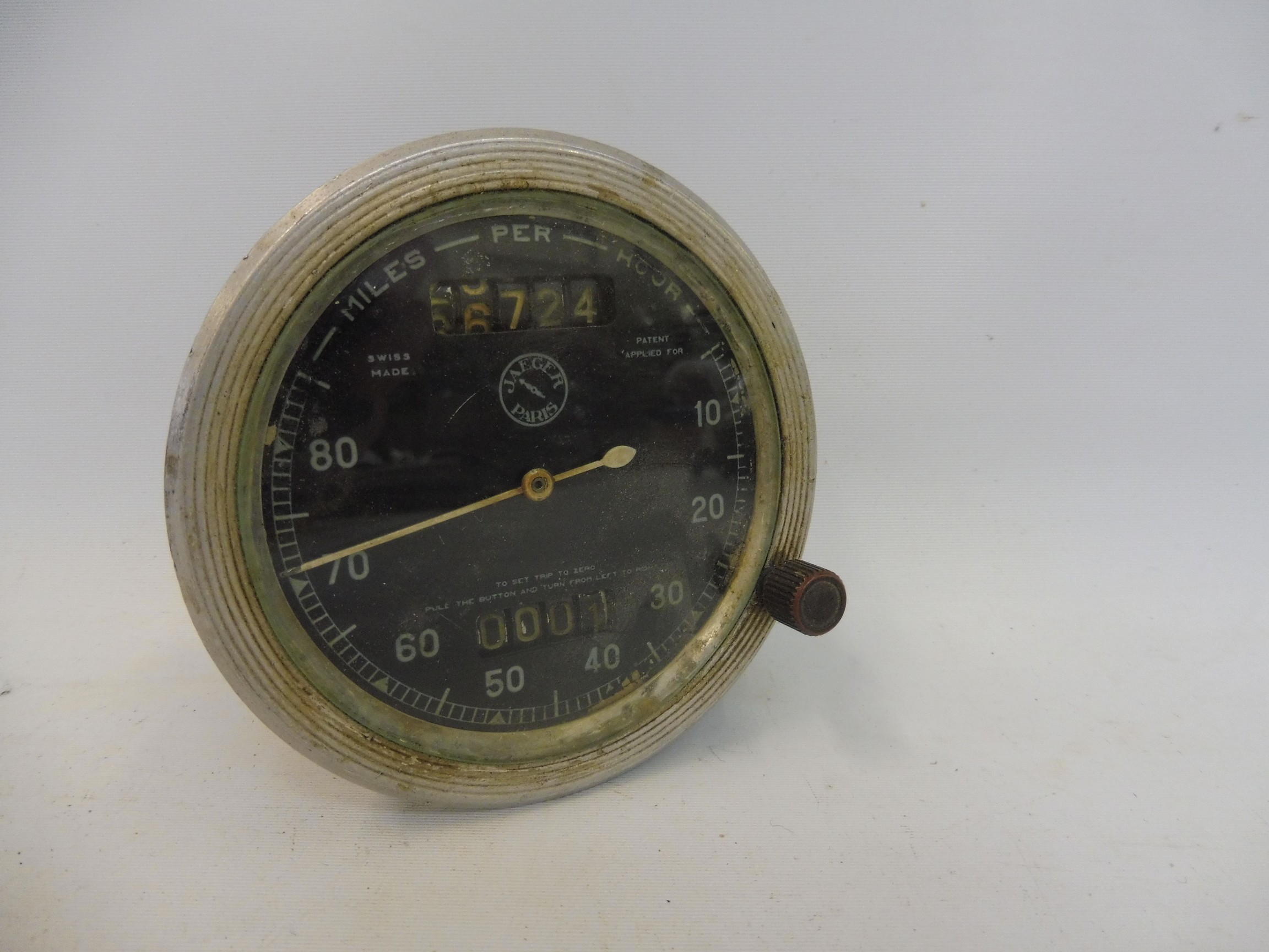 A Jaeger 0-80 mph black faced speedometer.