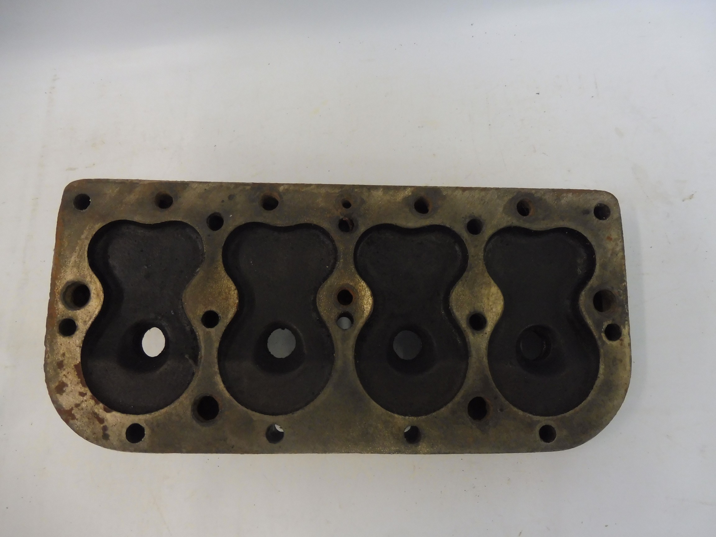 An Austin 7 cylinder head, marked 'AFIT', 'IA670' and '20 3 4' by repute a performance head. - Image 2 of 2