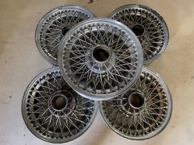 A set of five 16" diameter chrome wire wheels to suit Jaguar E type