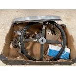 A box of asssorted Morris parts including a dished steering wheel, SU carburettor etc.