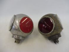 A pair of CAV divers helmet rear lamps.