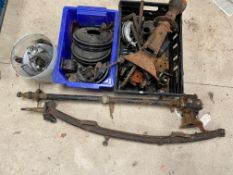 A selection of assorted parts, mainly Morris including a steering column, a front axle beam, rear
