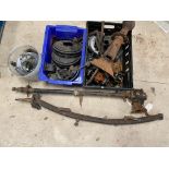 A selection of assorted parts, mainly Morris including a steering column, a front axle beam, rear