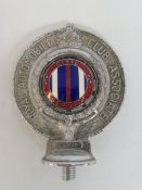 A Royal Automobile Club Associate car badge with Civil Service enamel centre, no. F57425.