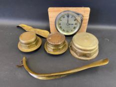 A North and Sons Watford car clock, plus three brass hub nuts, including one marked Worthy Steam