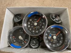 A selection of six instruments, possibly Rootes, including two 0-100 mph black faced speedometers.