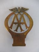 An AA type 2A or 2B car badge, angled bracket version, brass, no. 328805, circa 1925.