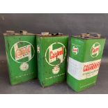 Three Castrol gallon cans.