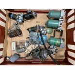 A tray of fuel pumps, oil filters, Stromberg carburettor etc.