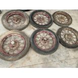 Six assorted Austin 7 wire wheels.