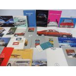 A selection of German car brochures including Audi, BMW, Mercedes-Benz, Opel etc.