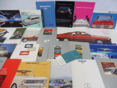 A selection of German car brochures including Audi, BMW, Mercedes-Benz, Opel etc.