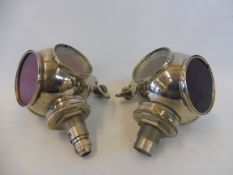 A pair of 'Toby' nickel plated diver's helmet rear lights.