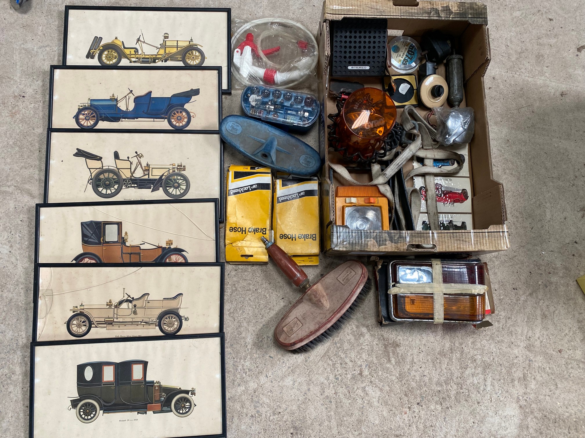 A box of assorted motoring collectables including a set of six car prints, boxed brake hoses, a