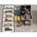 A box of assorted motoring collectables including a set of six car prints, boxed brake hoses, a
