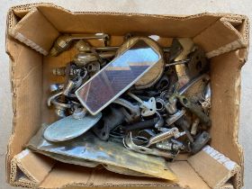 A tray of old car mirrors, bonnet pull, handle etc.