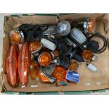 A tray of indicators, light fittings etc.