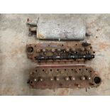 Two Volvo B18 cylinder heads, one rocker shaft, new old stock rear silencer etc. for Amazon or