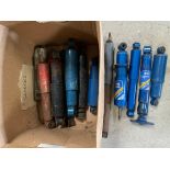A box of shock absorbers, some new old stock.