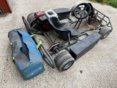 A Stratos go kart fitted with a Honda GX120 engine, plus spare wheels.