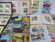 A box of old car Shire books, car postcard albums plus three framed pictures of various late 1930s