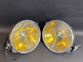 A good pair of Lucas PR100 chrome plated headlamps, in generally very good condition except for a